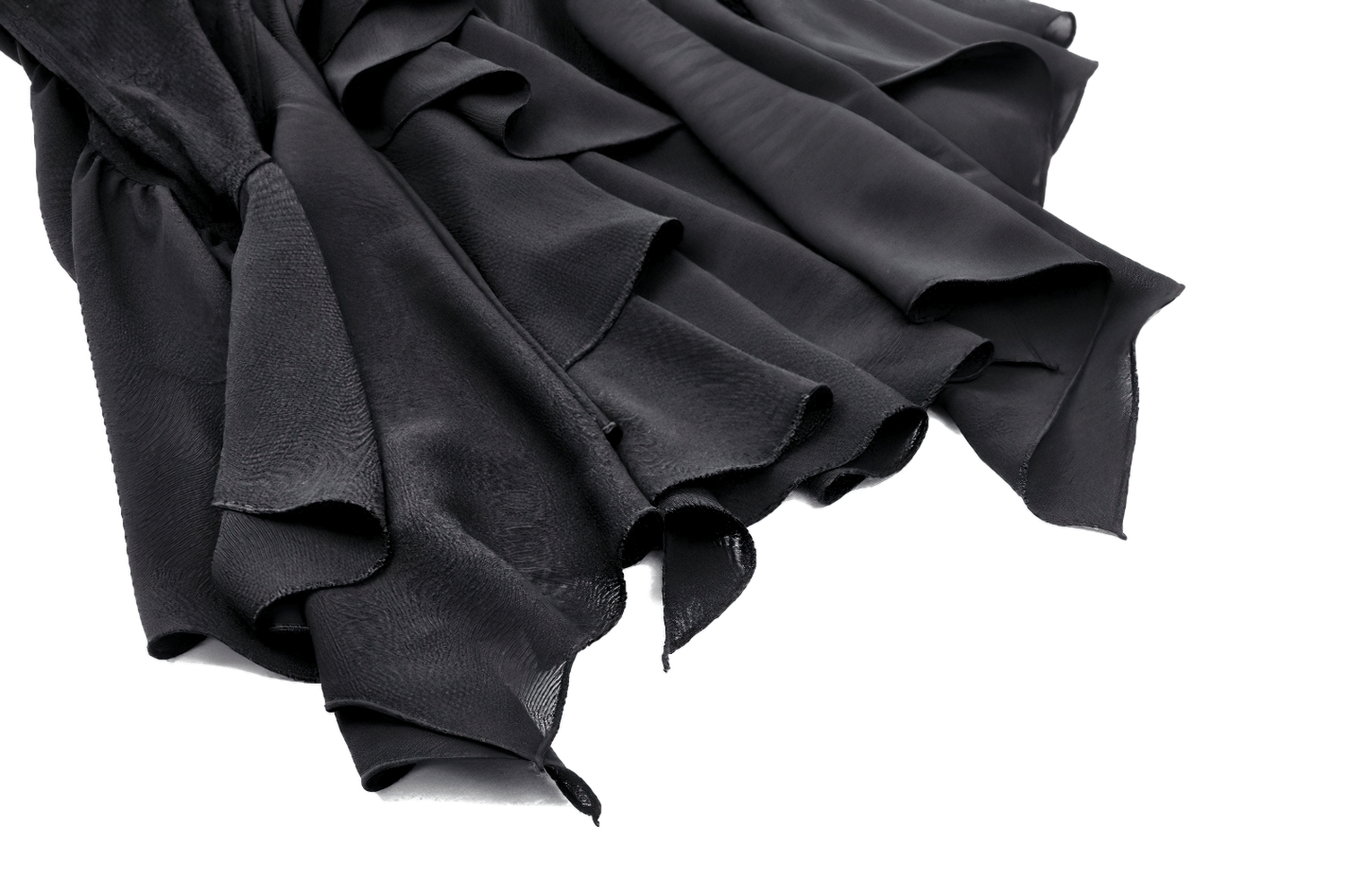 Flowy black fabric showcasing elegant asymmetrical ruffles for a long skirt with a whimsical touch.