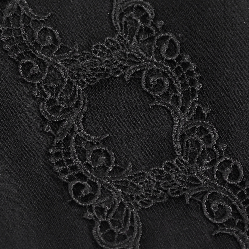 Elegant black guipure lace detail on fabric, perfect for gothic-style accessories like a bucket bag.