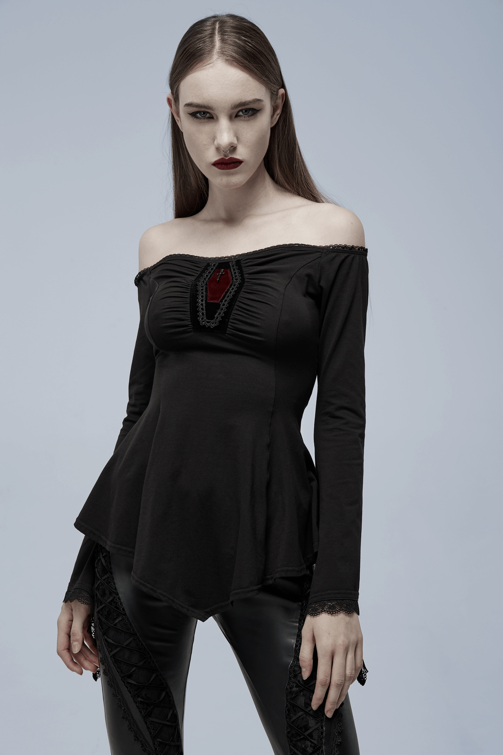 Elegant goth top with bell sleeves and coffin accent, perfect for stylish and mysterious outfits.