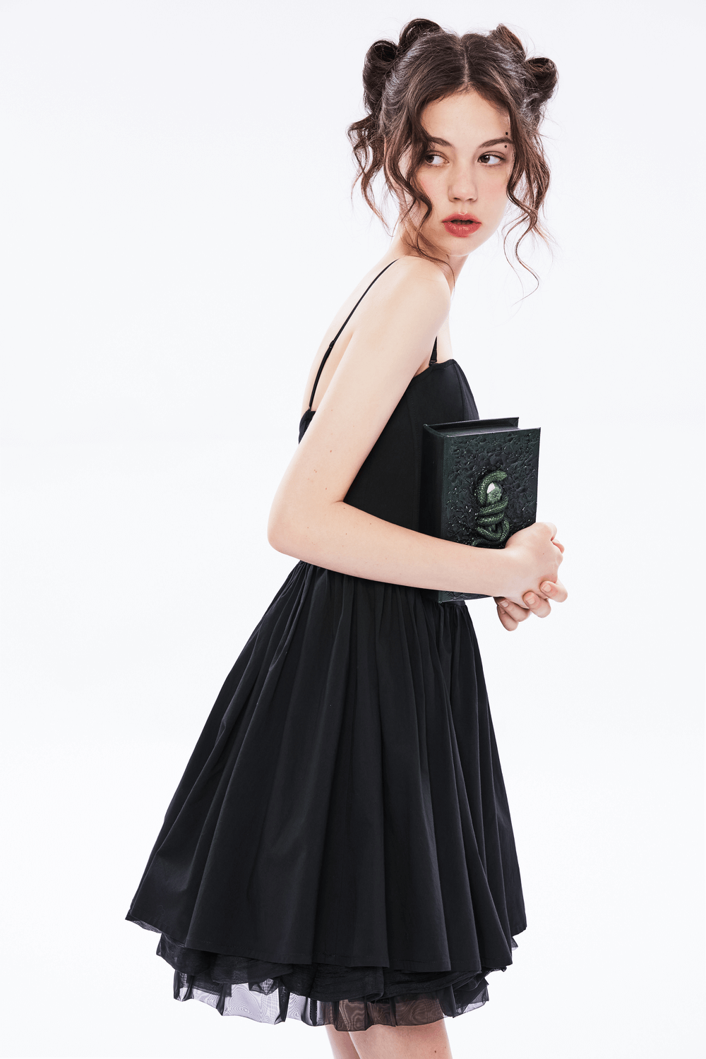 Elegant black A-line skater dress with pleated skirt and punk plaid, perfect for chic occasions.
