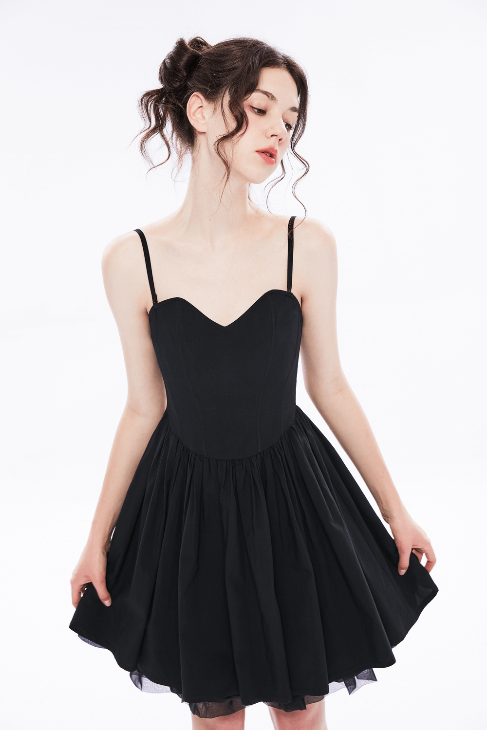 Elegant black A-Line skater dress with pleated skirt and adjustable straps for a chic look.