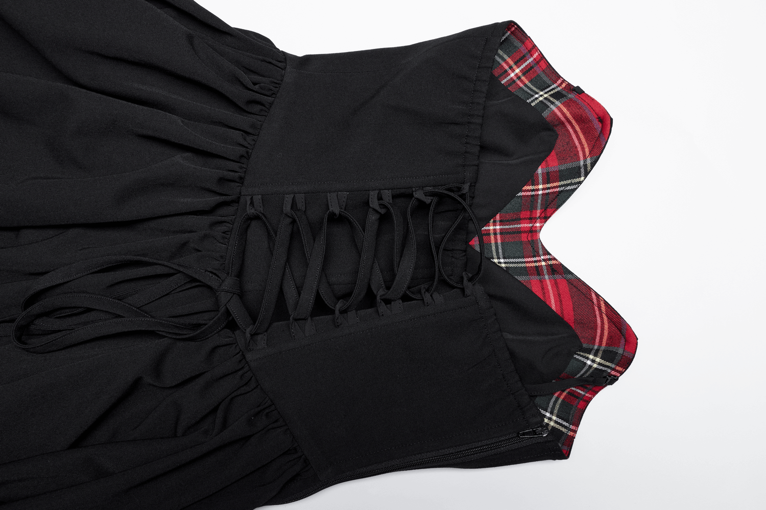 Elegant black A-line dress with plaid interior, showcasing detailed pleats and adjustable straps for a perfect fit.