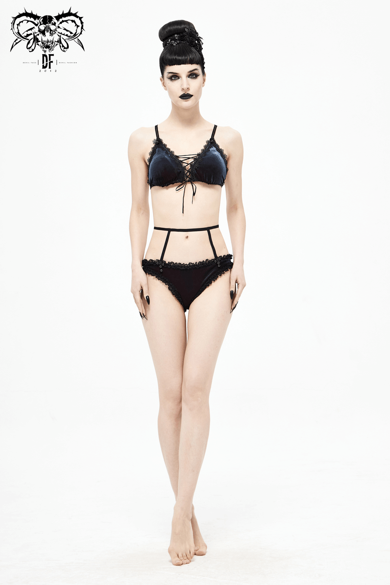 Elegant black and red bikini with lace inserts and straps, showcasing a gothic style for a sexy swimsuit look.