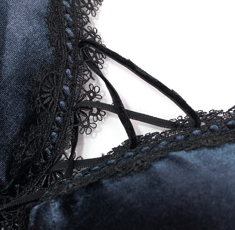 Close-up of elegant black bikini featuring lace inserts and stylish straps, perfect for a gothic-inspired swimwear look.