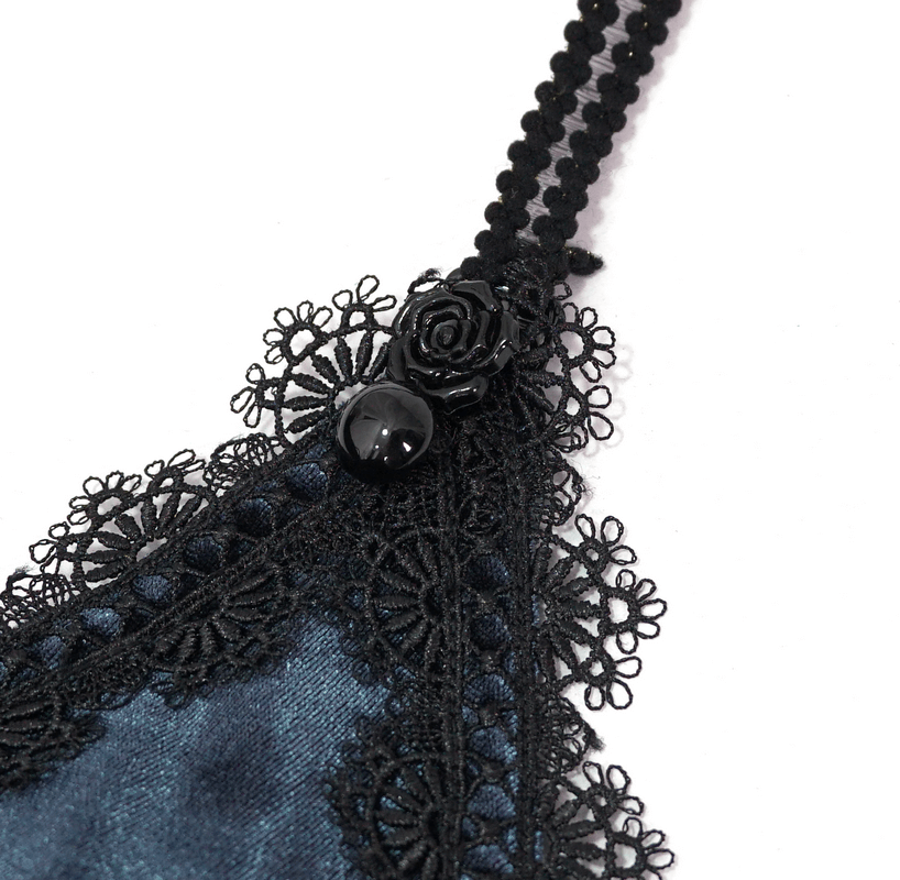 Close-up of black lace detail on elegant black and red bikini straps, showcasing gothic style craftsmanship.