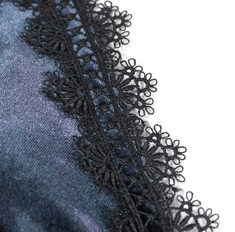 Close-up of elegant black lace detailing on a gothic-style bikini, showcasing intricate floral patterns.