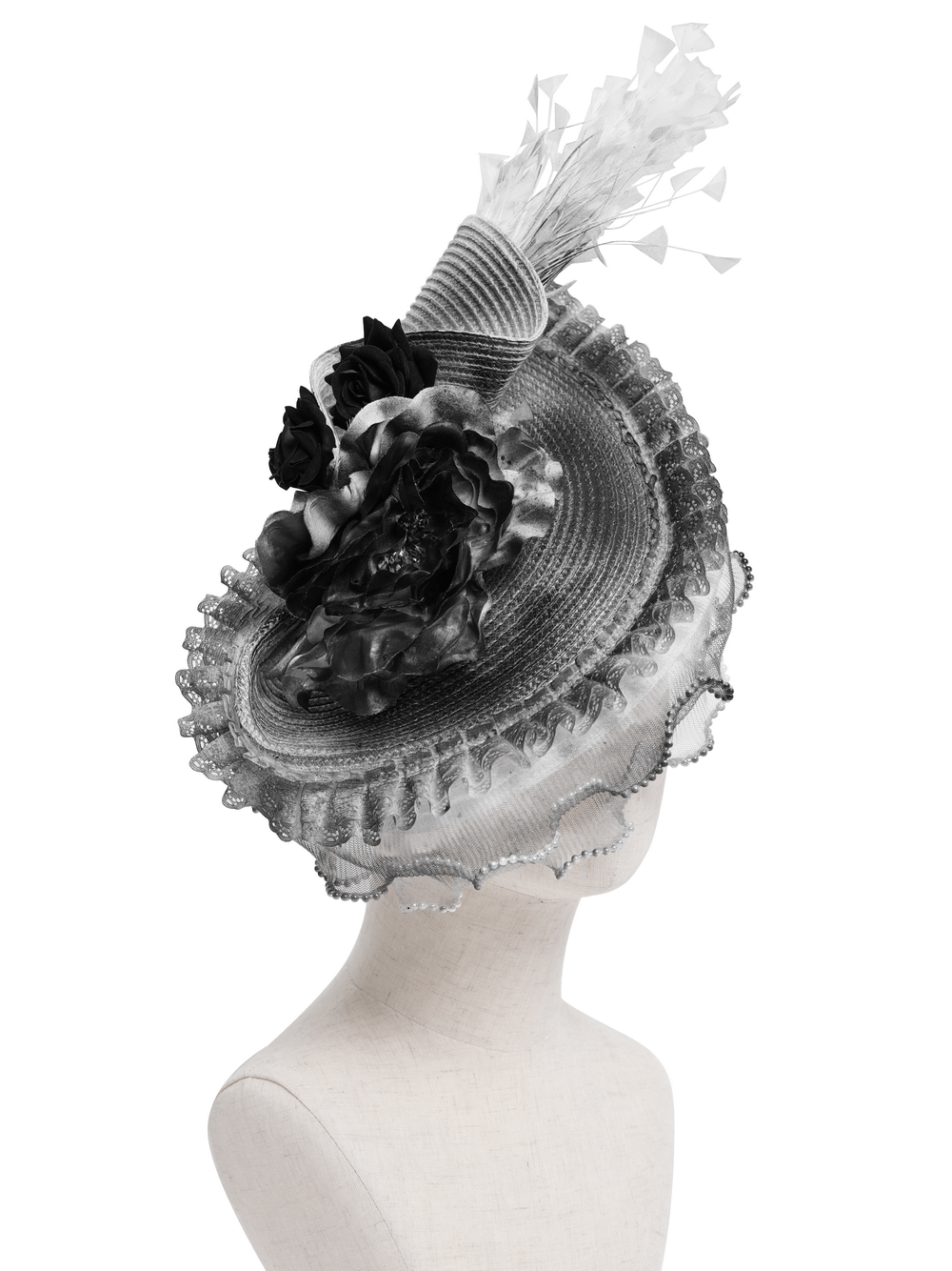 Elegant black and white floral fascinator hat with feathers, perfect for special occasions and gothic events.
