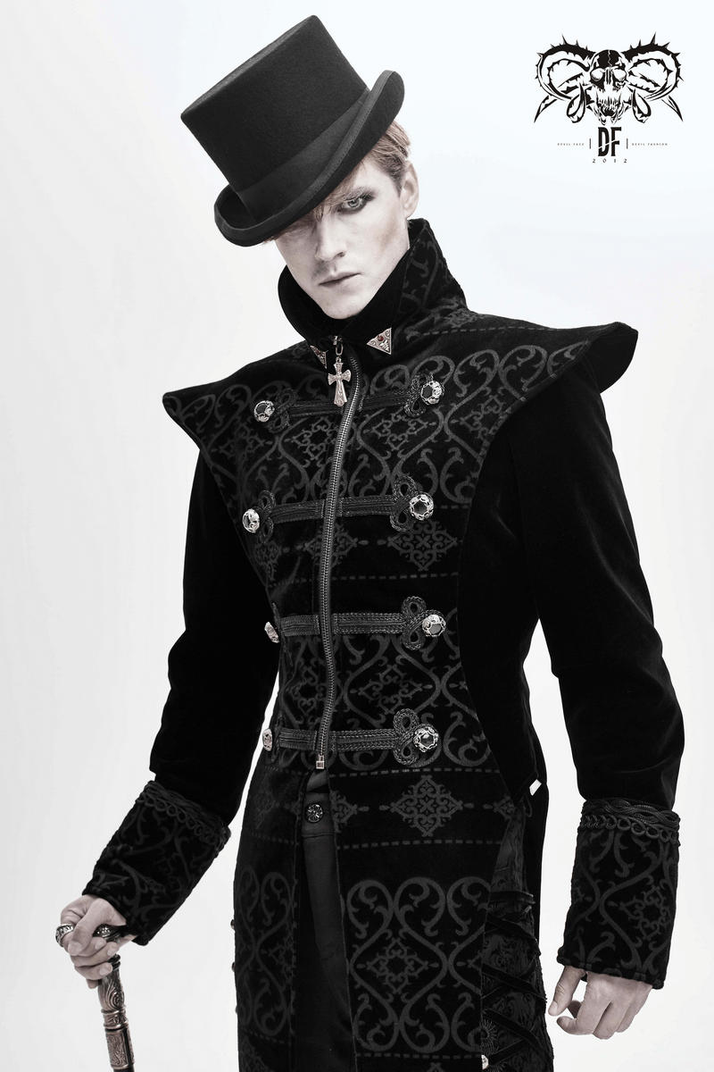 Elegant black gothic coat with pointed shoulders and engraved buttons, worn by a model in a top hat.
