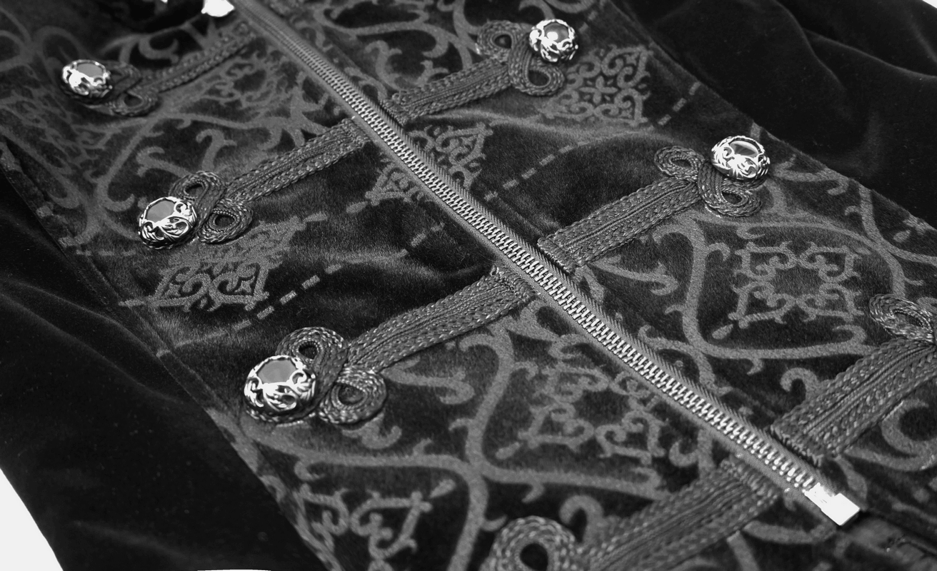 Close-up of an elegant black gothic coat featuring engraved silver buttons and intricate velvet patterns.