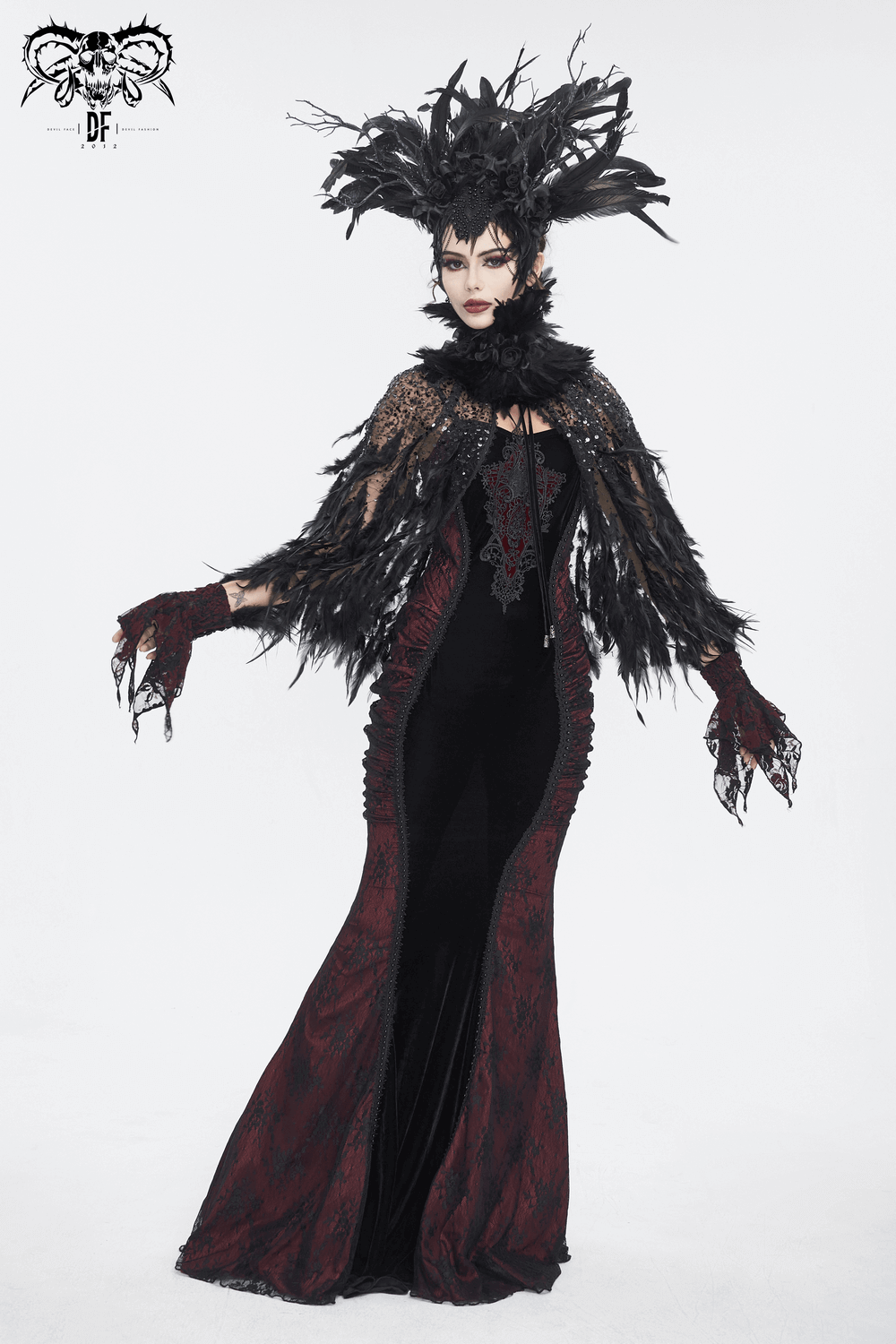 Elegant gothic outfit featuring black lace and feathers, perfect for a dramatic, romantic look.