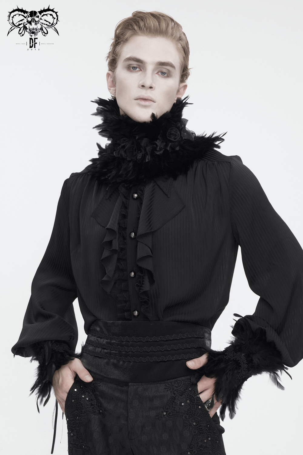 Gothic black collar with fabric flowers and feathers, worn by a model in a stylish outfit, showcasing elegance and drama.