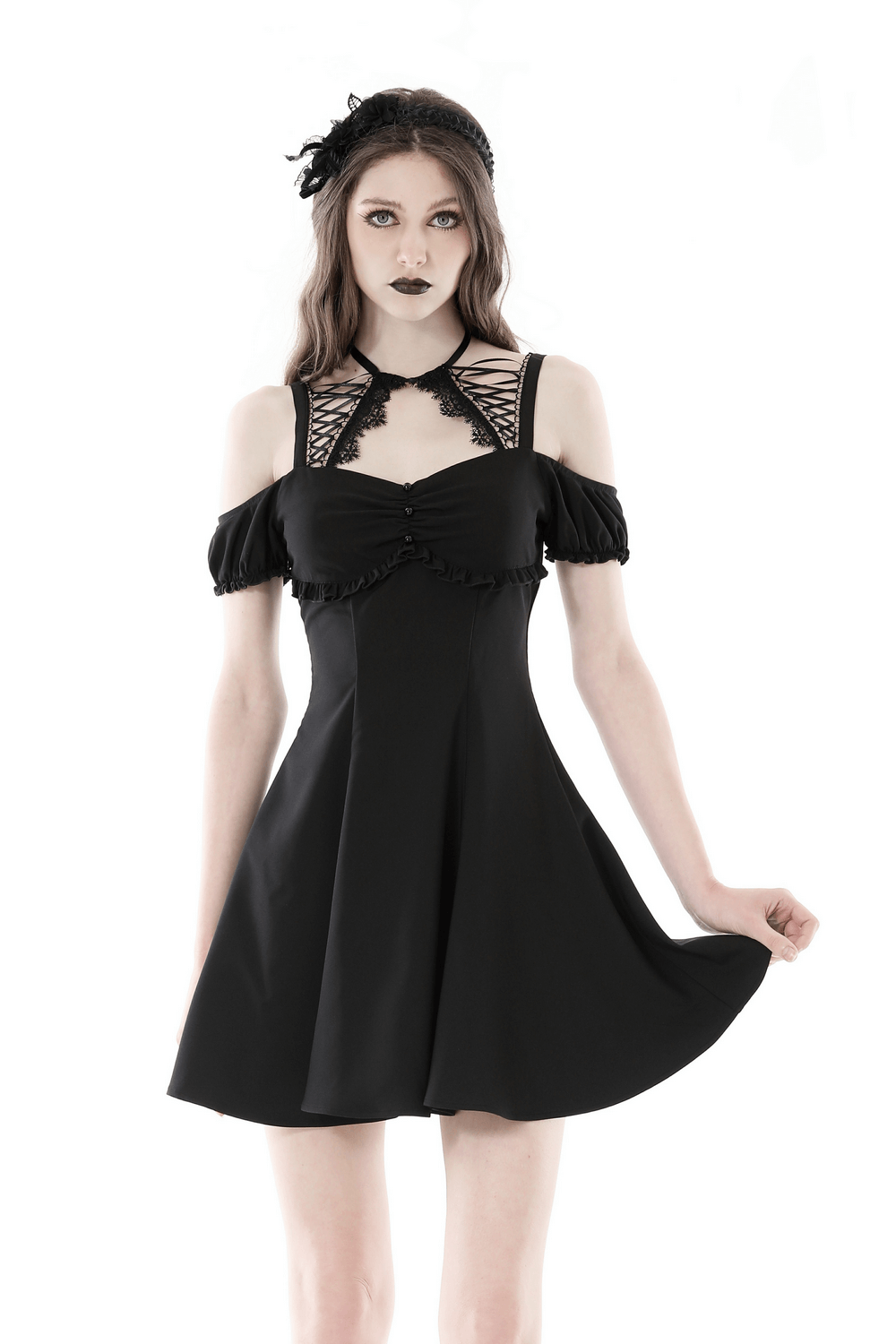 Elegant Black Dress with Unique Neckline and Sleeve Detail