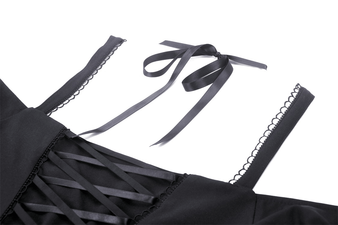 Elegant black dress with unique strappy neckline and sleeve detail, perfect for gothic-inspired fashion.