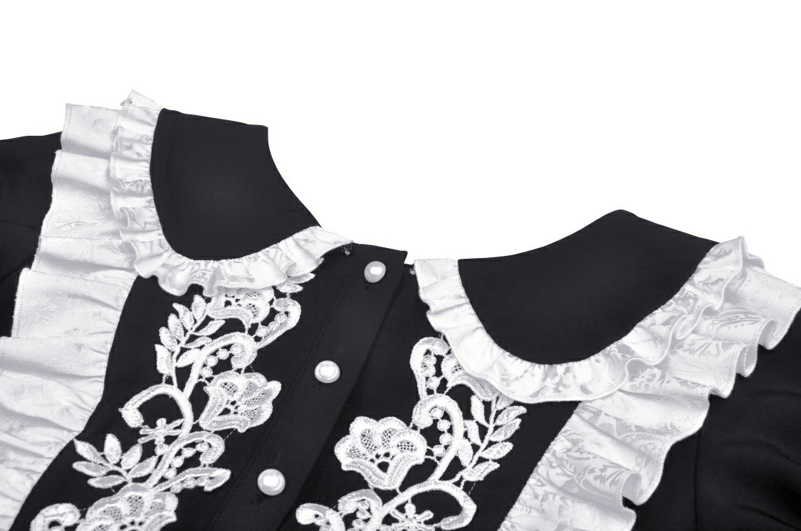 Elegant black dress with white floral embroidery and Peter Pan collar, perfect for chic occasions.