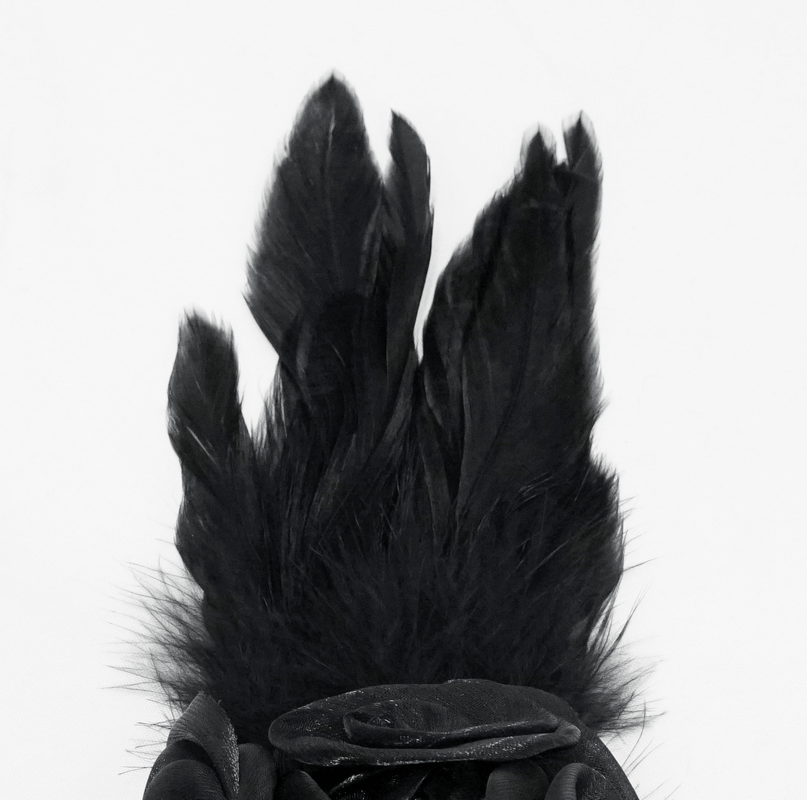 Elegant black flower hair clip with feathers, perfect gothic accessory for stylish women.