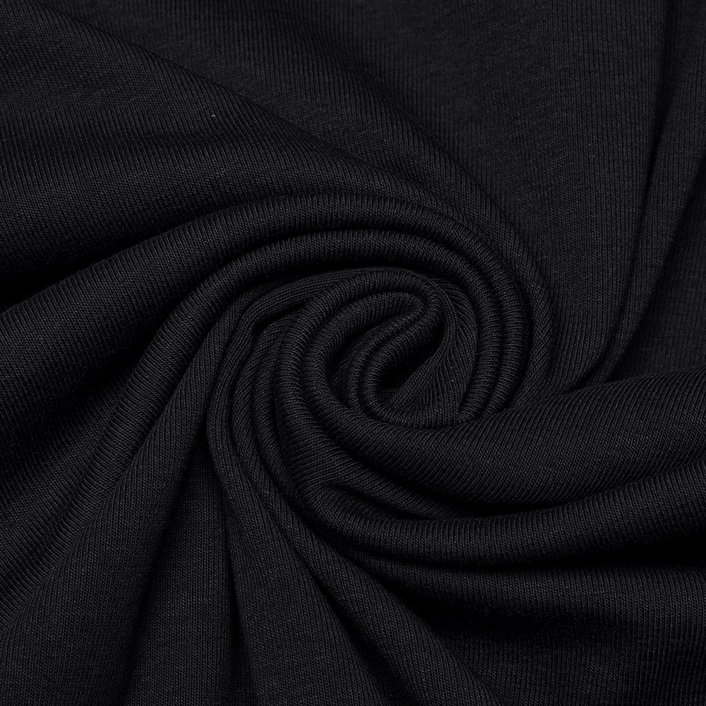 Close-up of soft, black knitted fabric with a stylish swirl pattern, perfect for a gothic fashion statement.