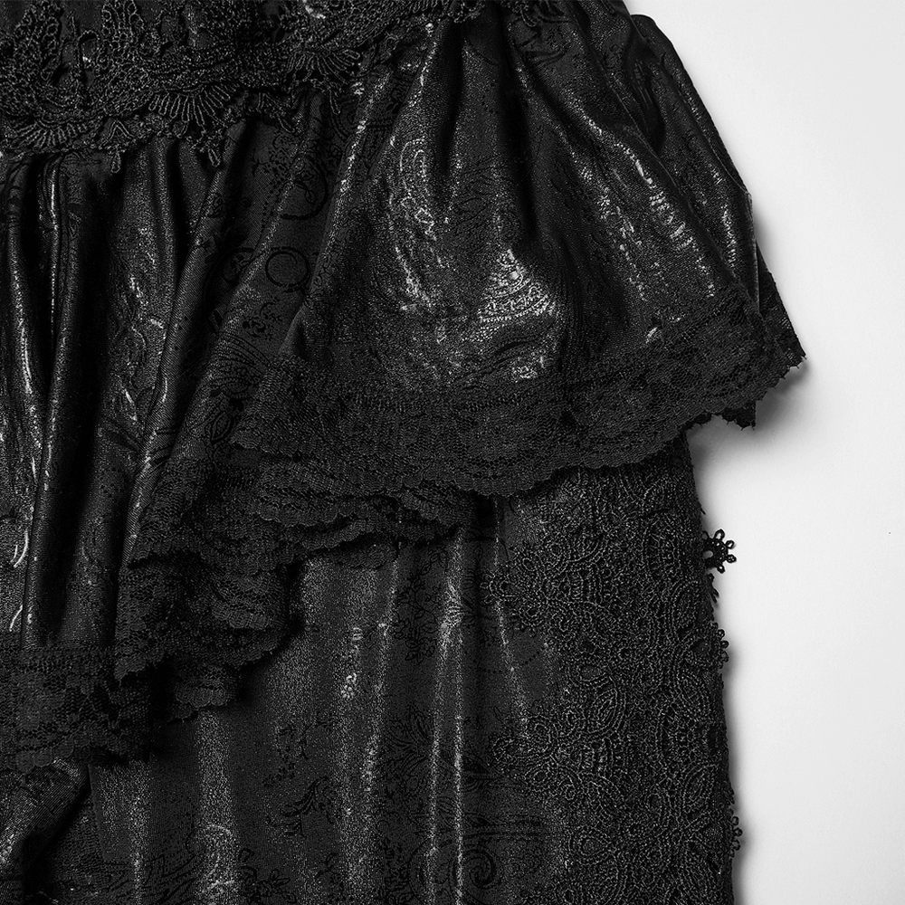 Elegant Black Gothic Flared Pants with Lace Skirt Overlay featuring intricate lace trim and a dramatic layered silhouette.