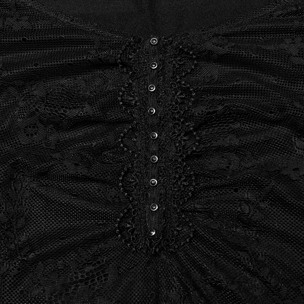 Close-up of elegant black lace dress featuring studded lace webbing and textured knitted fabric details.