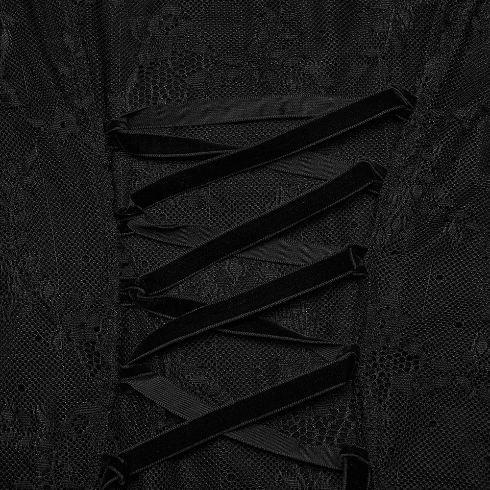 Close-up of intricate lace detailing and adjustable drawstring on black gothic lace dress.