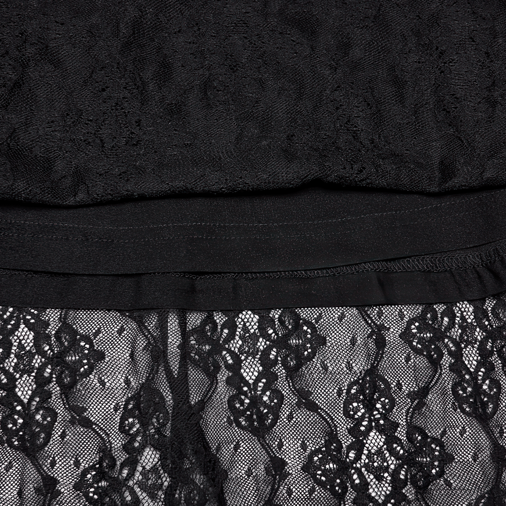 Alt Tag: Elegant Black Gothic Lace High Low Hollow Ruffle Dress close-up of black floral lace overlay with waistband and stitched trim detail