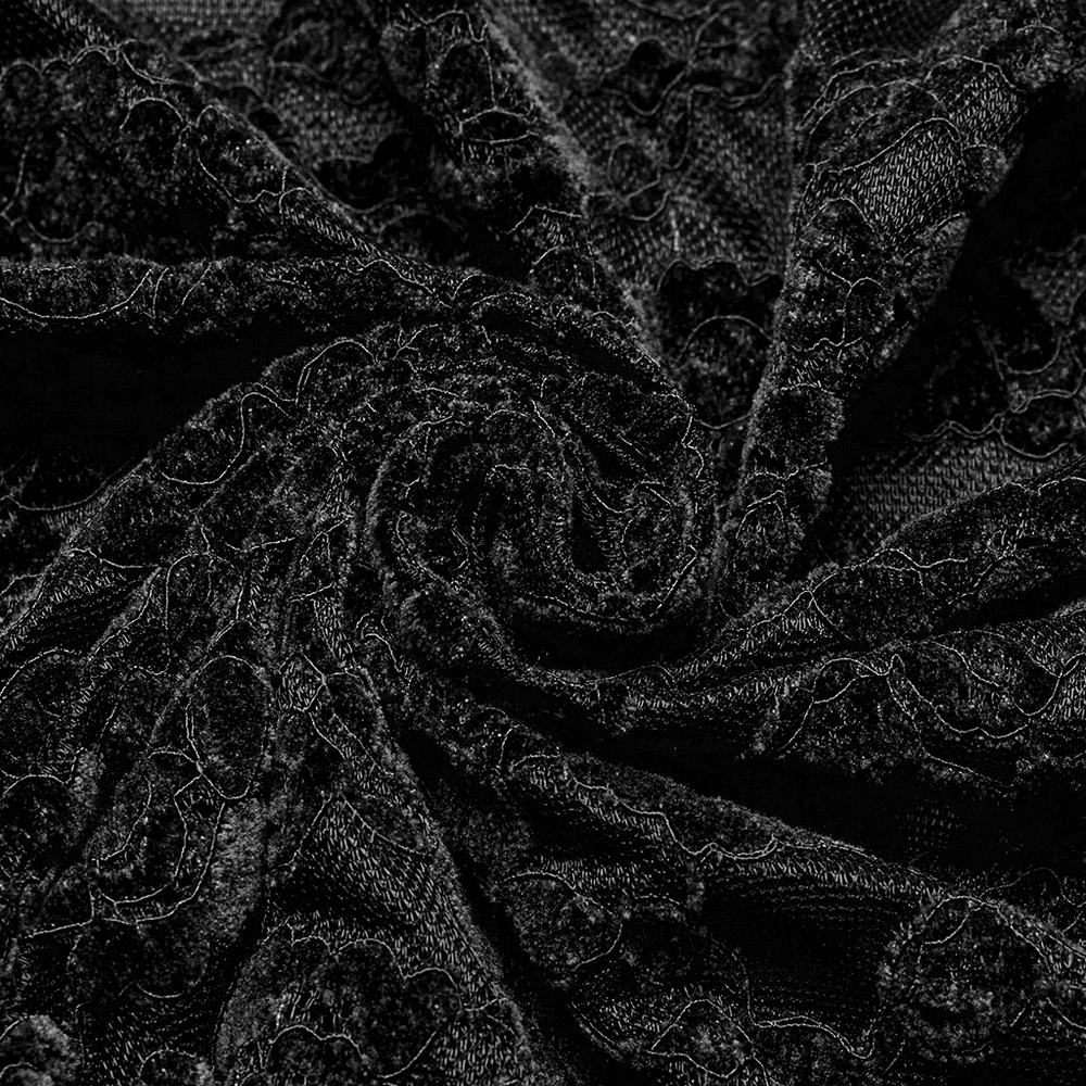 Close-up of elegant black gothic lace fabric, showcasing intricate details and texture, perfect for a dramatic style.