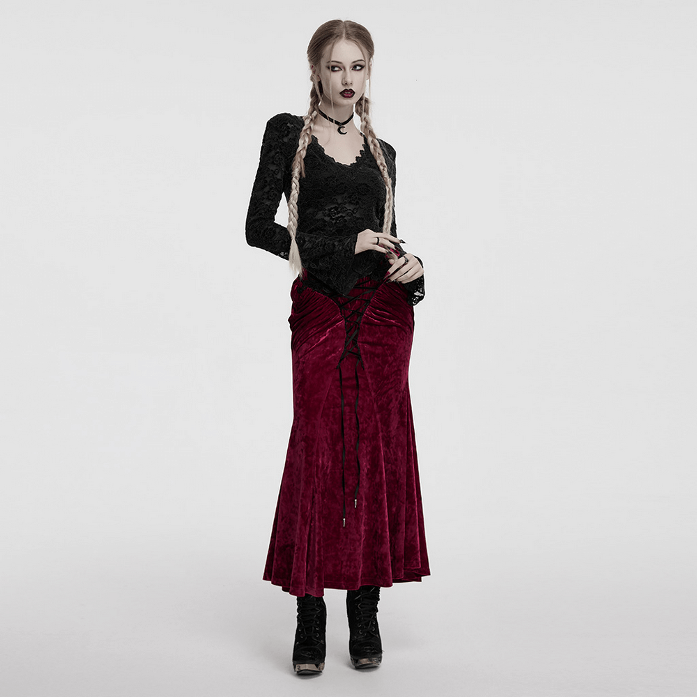 Elegant black gothic lace long sleeve top paired with a dark red velvet skirt, embodying a romantic, edgy style.
