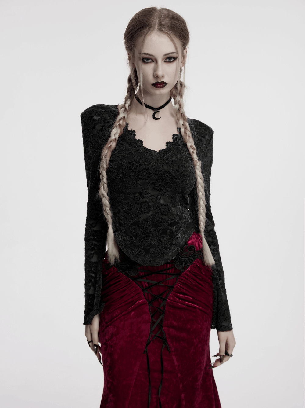 Elegant black gothic lace long sleeve V-neck top paired with a red velvet skirt, showcasing a dark romantic style.