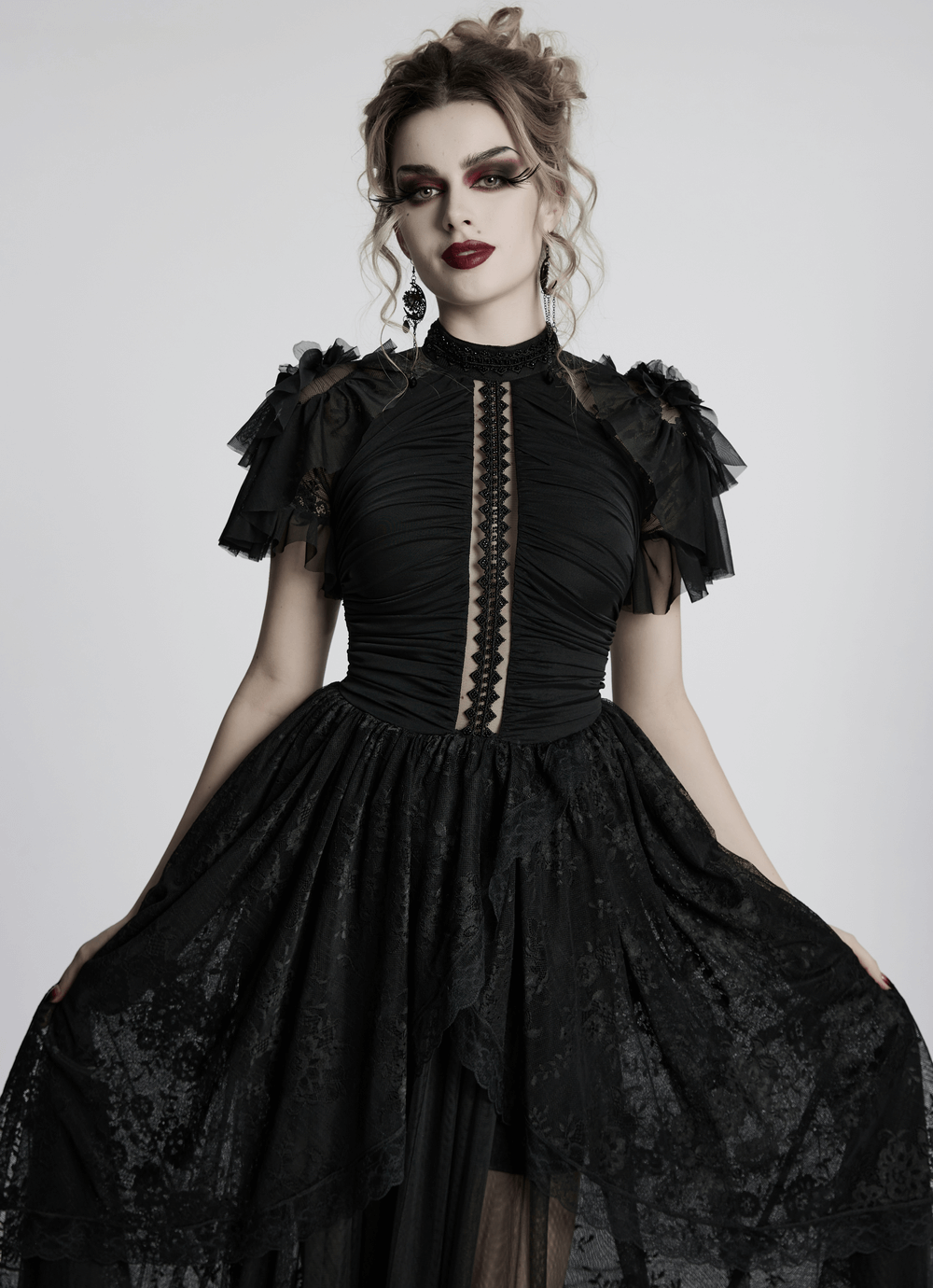 Elegant black gothic lace maxi dress with ruffled sleeves and sheer back for a dark romantic look.