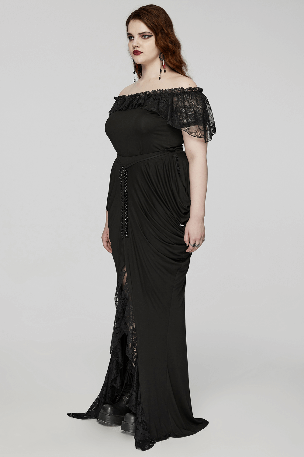 Elegant black gothic long skirt with lace detail, featuring pleats and chains, perfect for a chic gothic look.