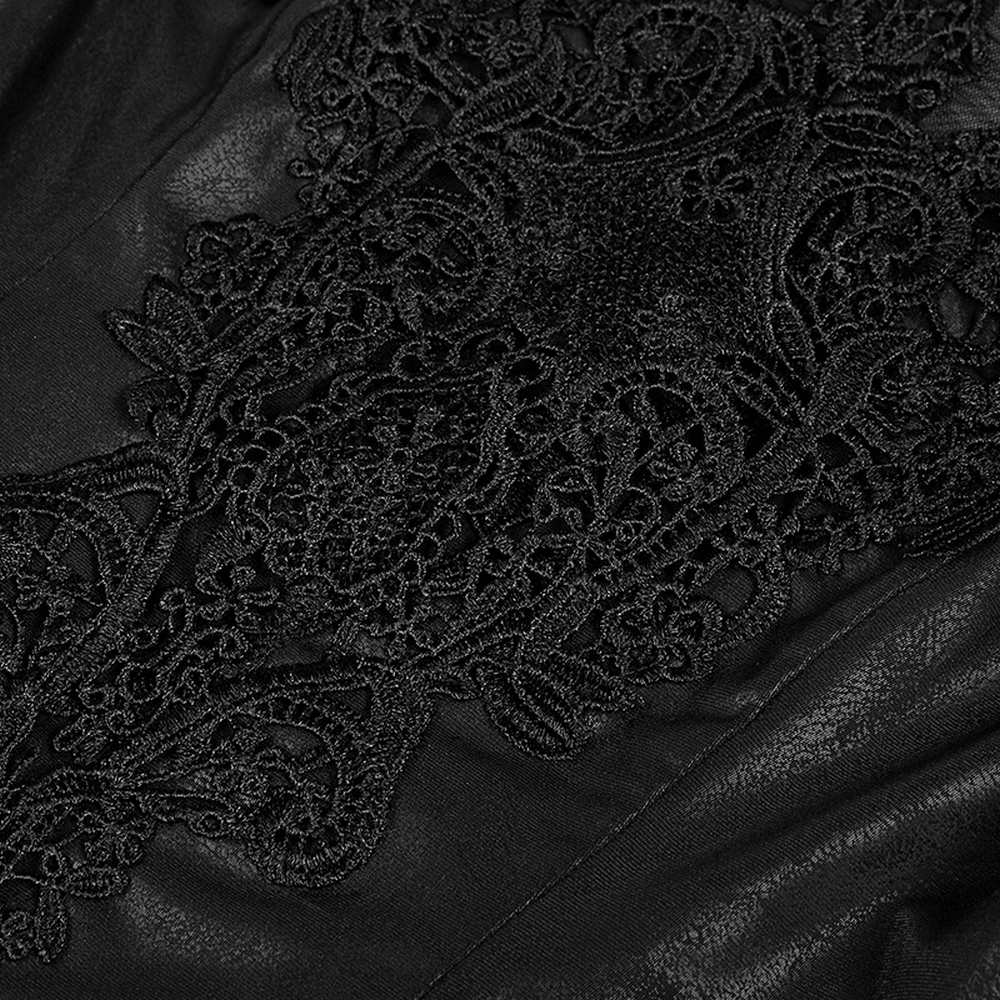 Close-up of intricate black lace detailing on a Gothic witch dress, showcasing elegant design and texture.
