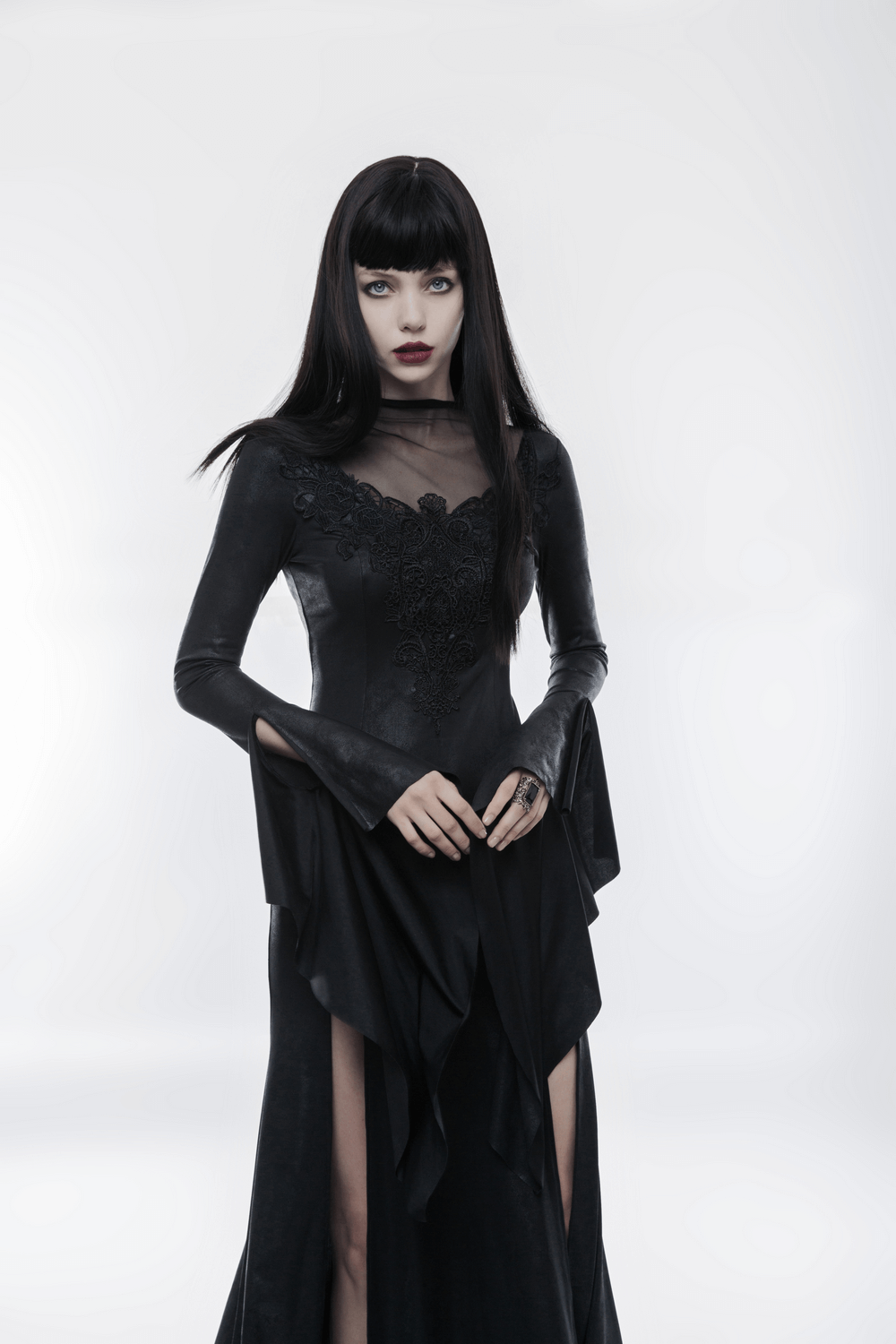 Elegant black gothic lace high slit witch dress, featuring intricate lace decals and long flowing sleeves.