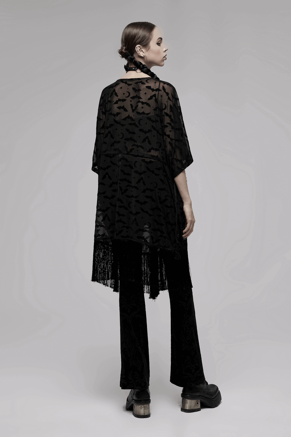 Elegant black lace bat print kimono-cape with tassels, showcasing a mysterious design and lightweight fabric.