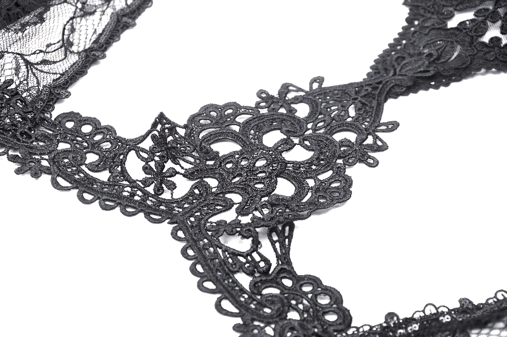 Close-up of elegant black lace detailing perfect for bolero shrugs and evening wear accessories.