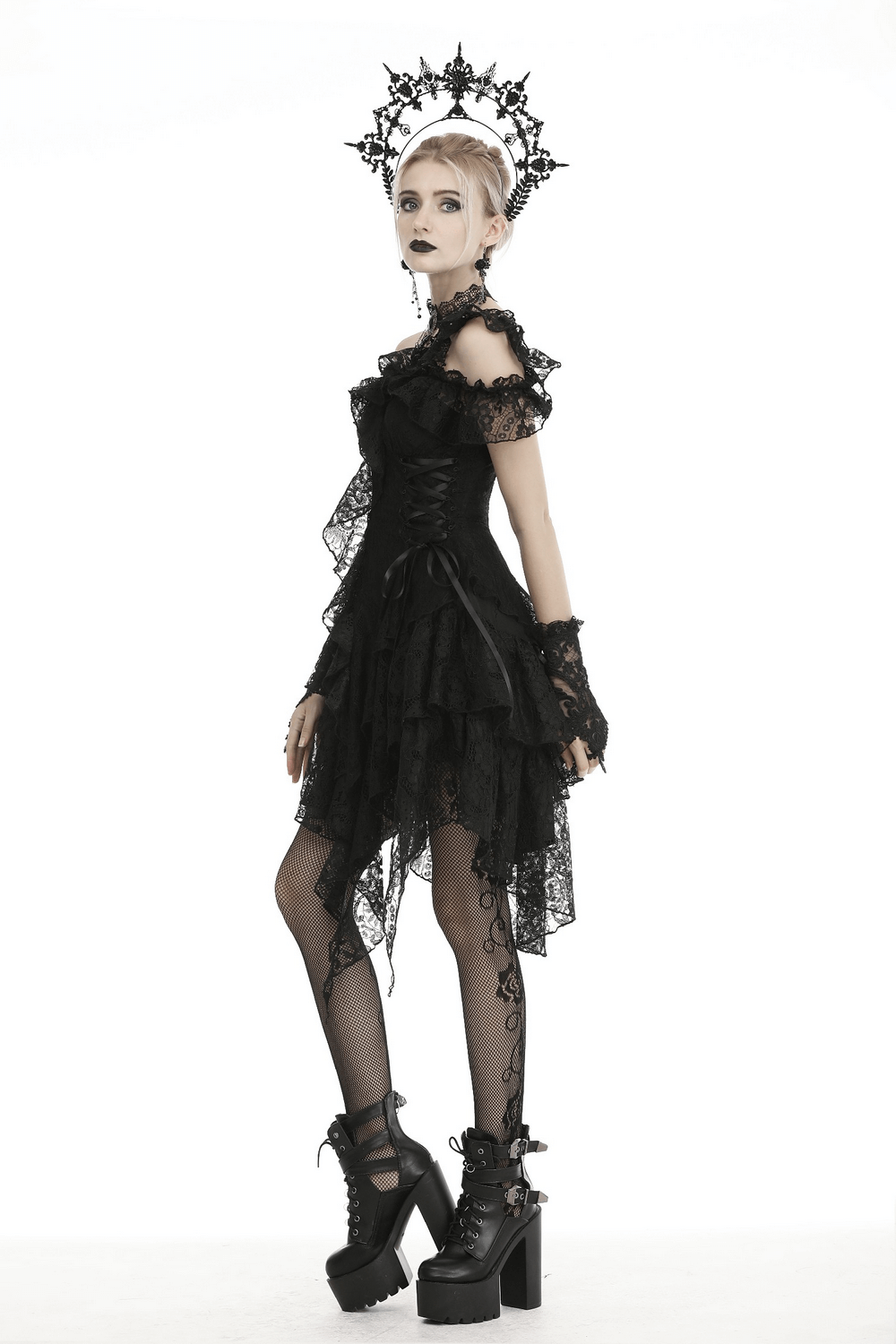 Elegant black lace dress with sheer overlay, ruffles, and ribbon accents, perfect for dark romantic vibes.