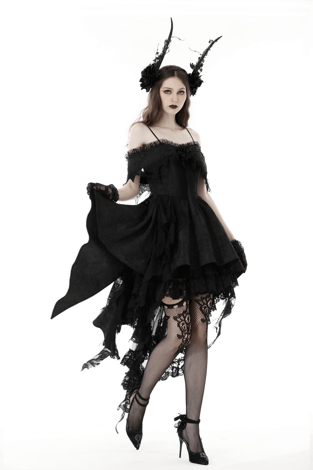 Gothic-inspired black lace evening dress with asymmetrical hem and floral detailing, perfect for elegant events.
