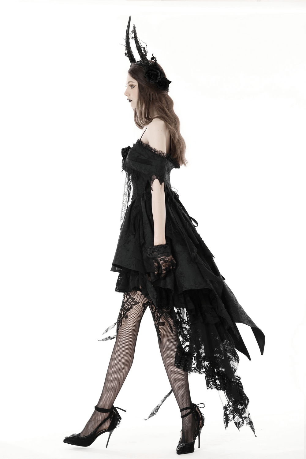 Elegant black lace evening dress with asymmetrical hem and gothic floral detailing, perfect for special occasions.