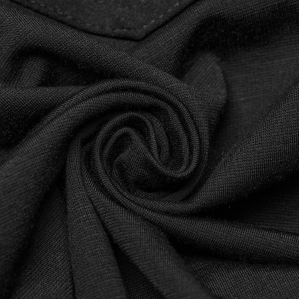 Close-up of elegant black elastic fabric, showcasing the texture of slim fit lace leggings for a gothic style.