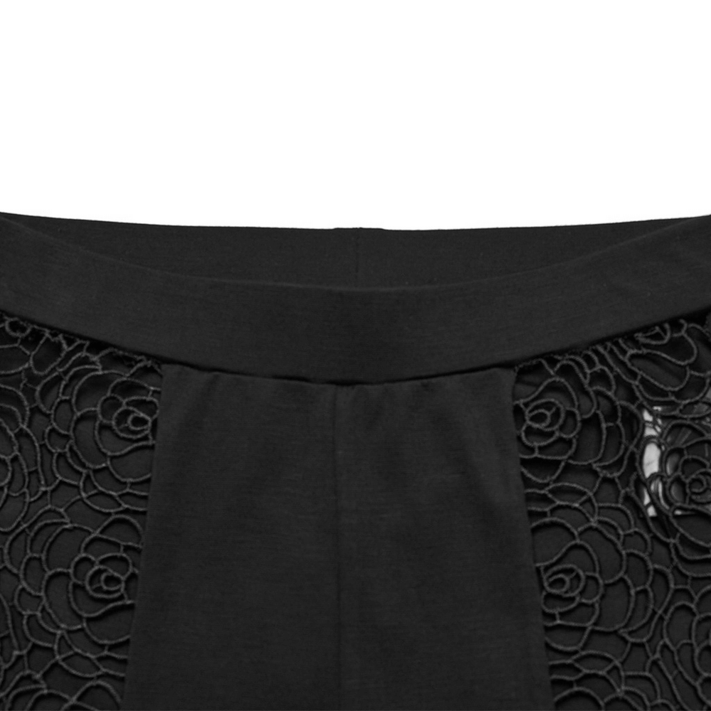 Elegant black lace hollow-out leggings showcasing intricate floral lace panels and a snug waistband.