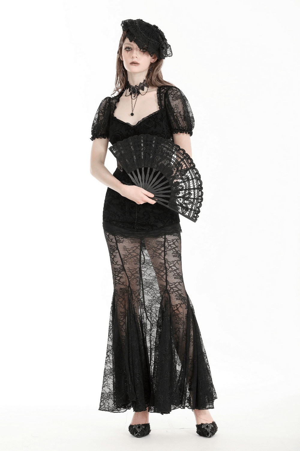 Elegant black lace mermaid dress with floral details, short sleeves, and a fan for special occasions.