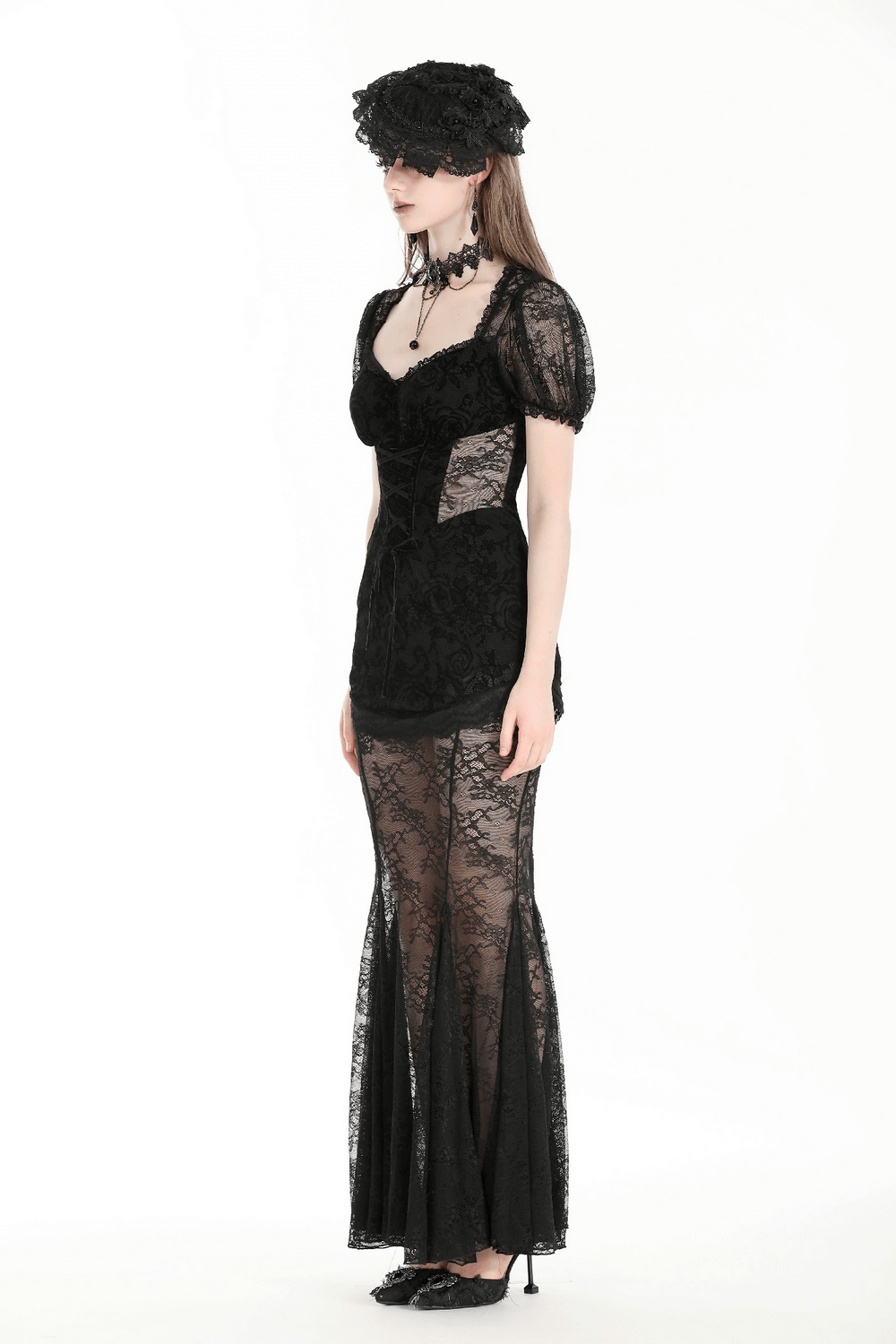 Elegant black lace mermaid dress with floral details, perfect for special occasions and upscale events.