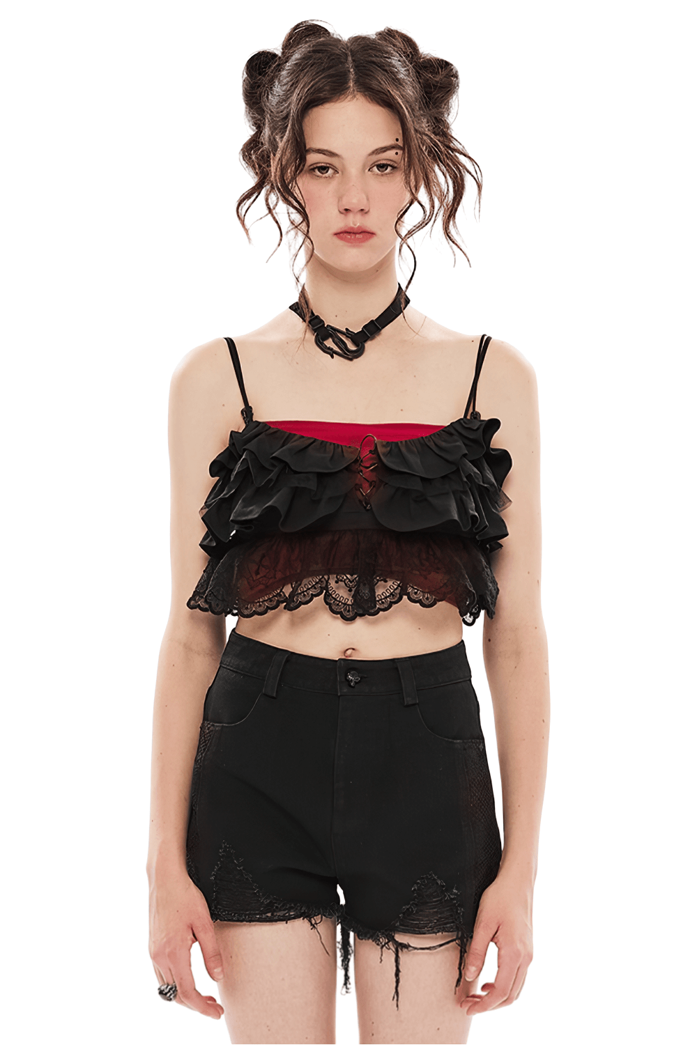 Model wearing an elegant black lace off-the-shoulder top with ruffled V-neck, paired with distressed black shorts.