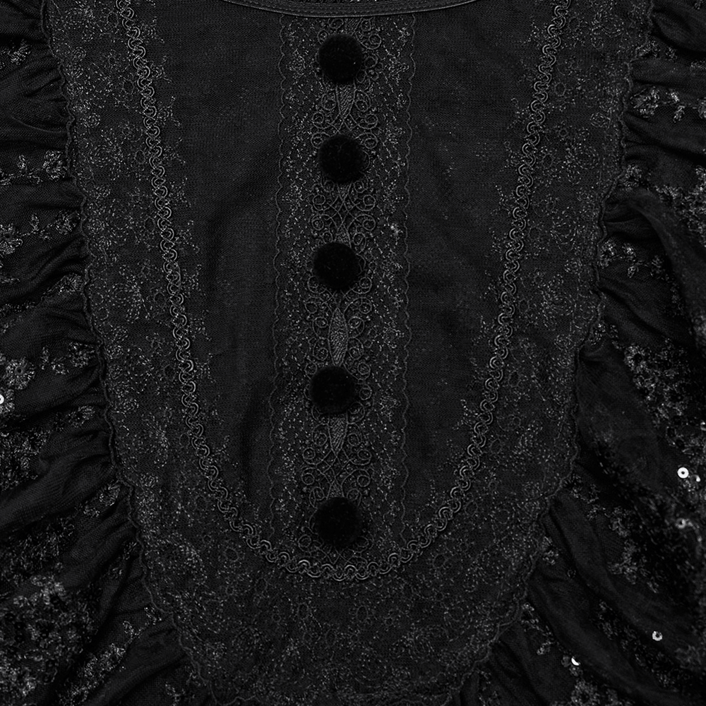 Detailed view of an elegant black lace blouse with ruffles and sequin embellishments, featuring unique button accents.