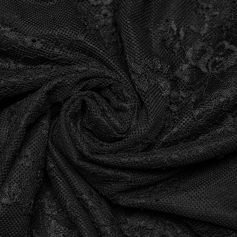 Close-up of elegant black lace fabric, showcasing intricate details and texture for gothic fashion flair.