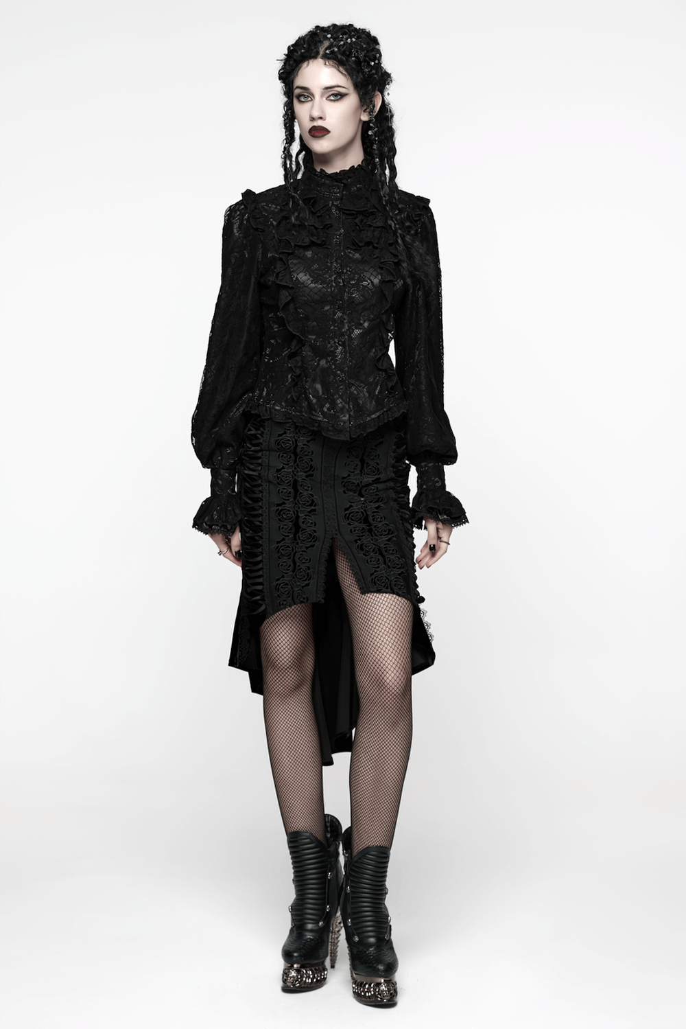 Elegant Black Lace Ruffled Gothic Long Sleeve Blouse worn with a dramatic layered skirt and stylish fishnet stockings.