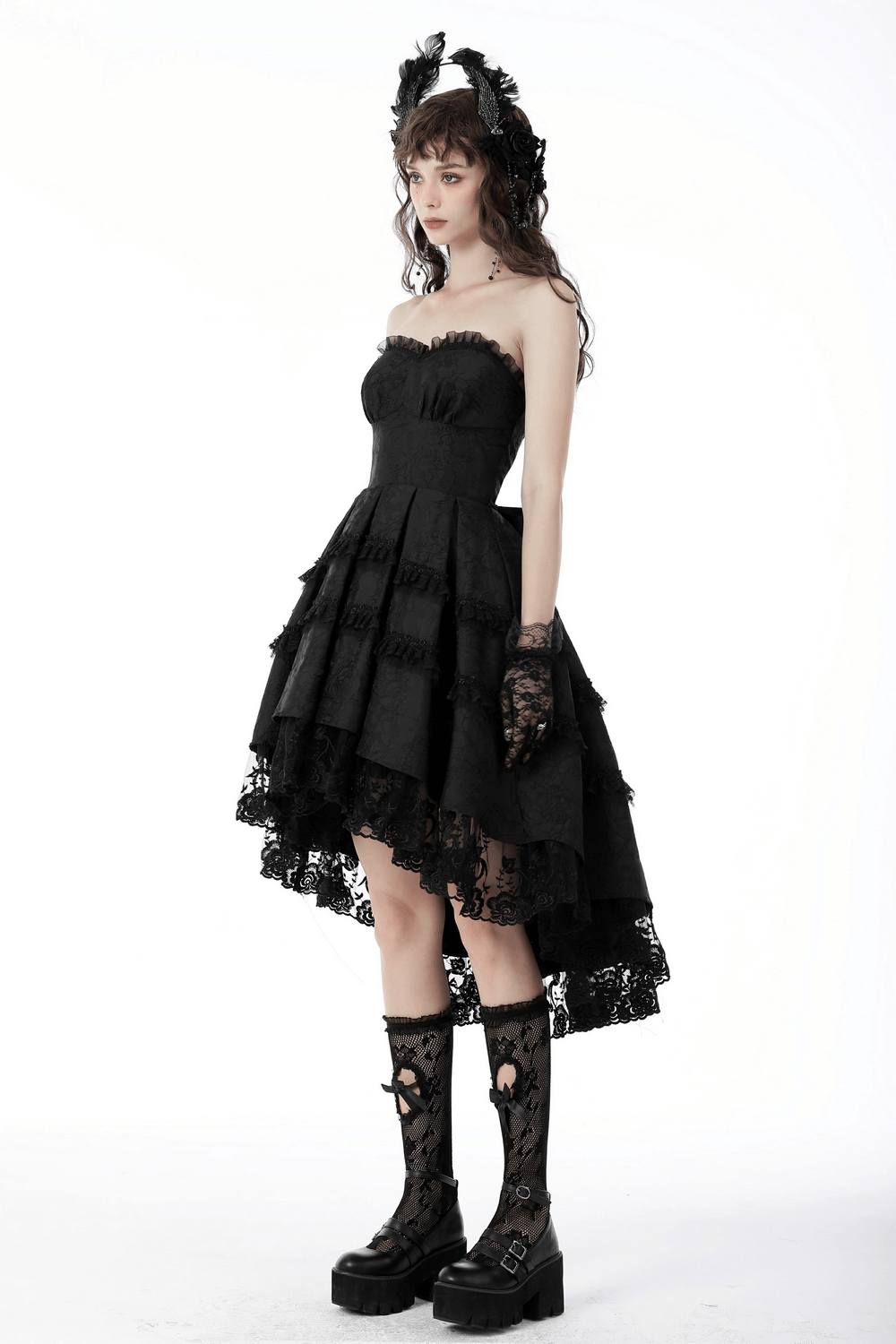 Elegant black lace tiered evening dress with intricate detailing, perfect for stylish night outs and special events.