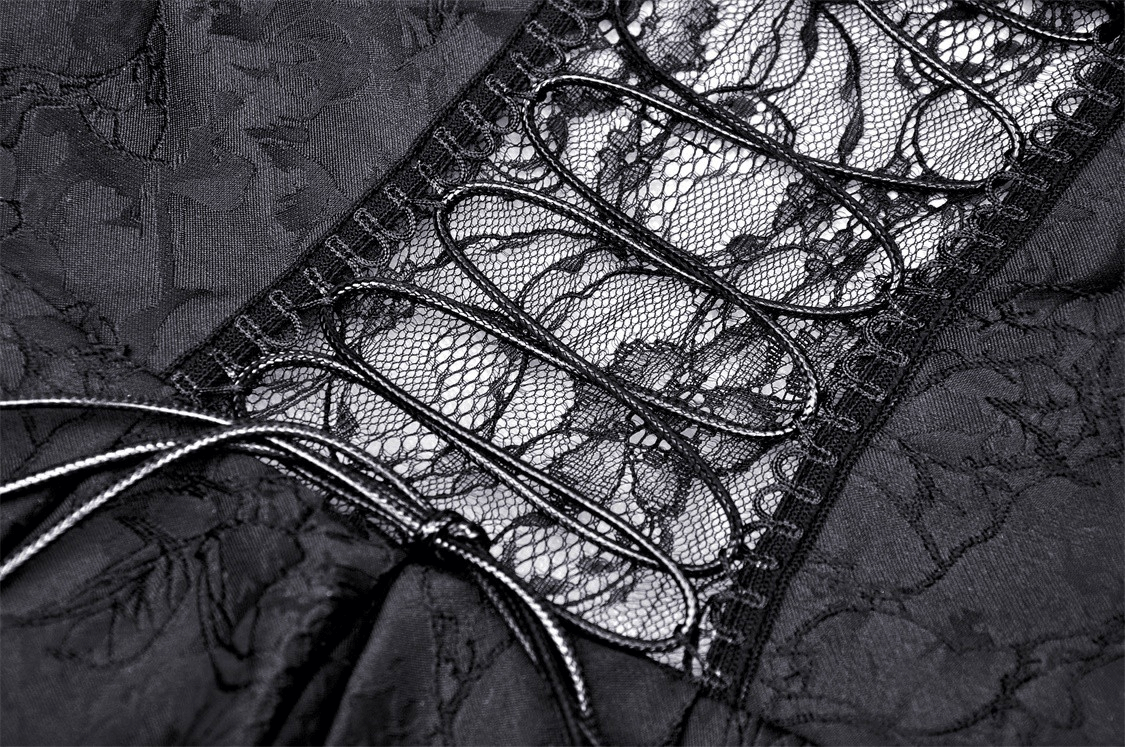 Intricate black lace detailing on elegant evening dress, showcasing tiered design and stylish accents.
