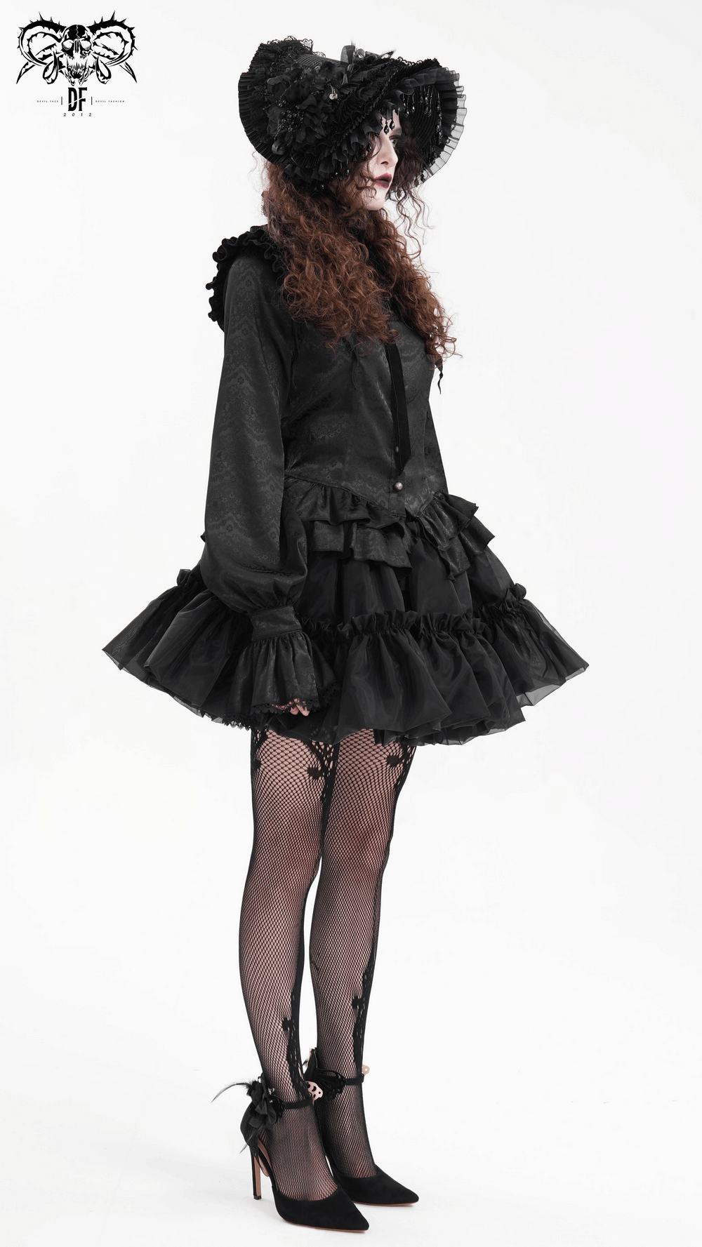 Elegant black Victorian bonnet with lace trim, paired with a stylish black outfit and fishnet stockings.