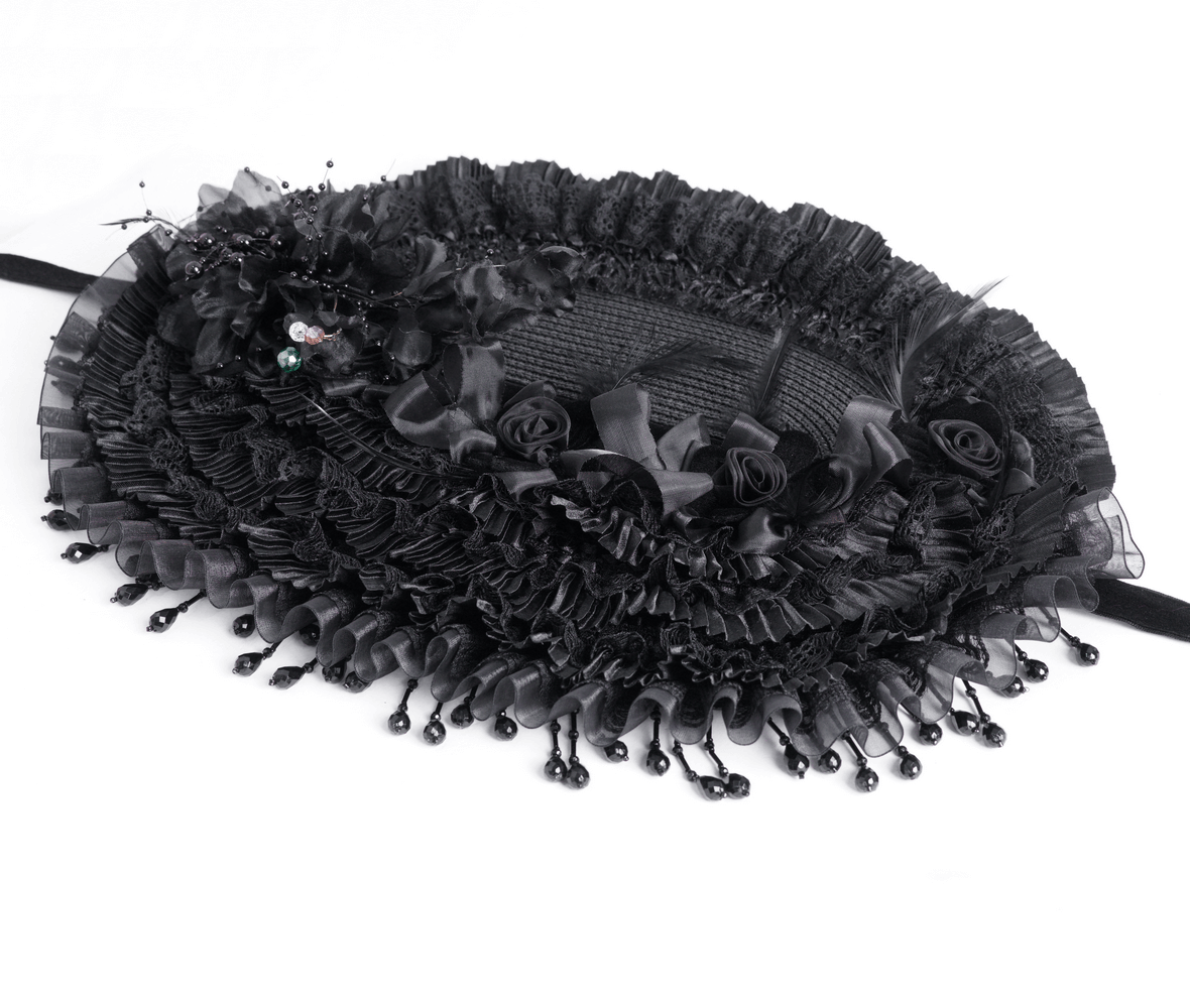 Elegant black lace Victorian bonnet with floral accents and ribbons, perfect for vintage-themed events.