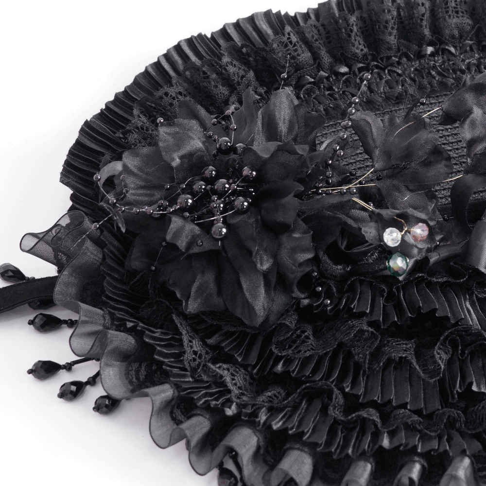 Elegant black lace Victorian bonnet with floral accents and ribbons for vintage-themed events.