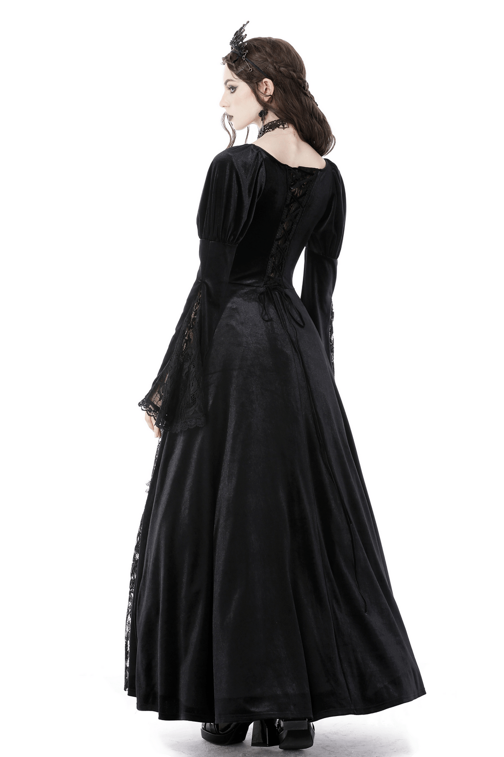 Elegant black lace Victorian gown showcasing intricate embroidery and flared sleeves, perfect for evening events.